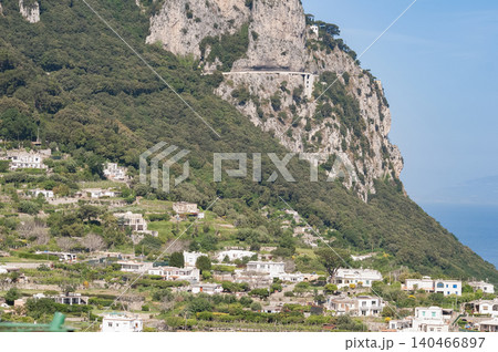 Coastal slopes of the island Capri with luxurious villas located on them. 140466897