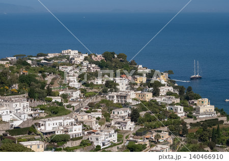 Coastal slopes of the island Capri with luxurious villas located on them. Coastal slopes of the island Capri with luxurious villas located on them. 140466910