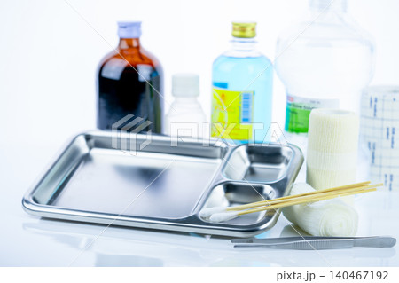 Medical equipment for treating infections. Wound care dressing set. Medical supplies for nurses. Conform bandage, forceps, cotton stick, alcohol. Sterile dressing materials. Healthcare equipment. Medical equipment for treating infections. Wound care dressing set. Medical supplies for nurses. Conform bandage, forceps, cotton stick, alcohol. Sterile dressing materials. Healthcare equipment. 140467192