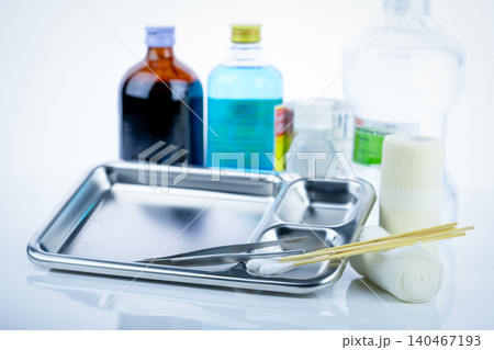 Medical equipment for treating infections. Wound care dressing set. Medical supplies for nurses. Conform bandage, forceps, cotton stick, alcohol. Sterile dressing materials. Healthcare equipment. Medical equipment for treating infections. Wound care dressing set. Medical supplies for nurses. Conform bandage, forceps, cotton stick, alcohol. Sterile dressing materials. Healthcare equipment. 140467193