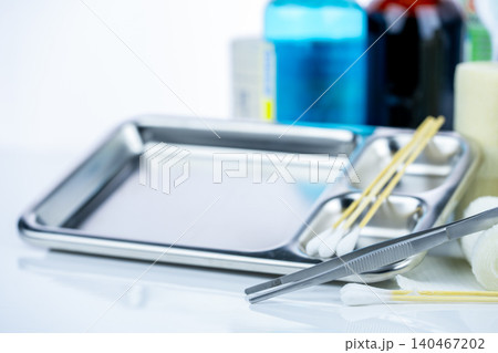 Medical equipment for treating infections. Wound care dressing set. Medical supplies for nurses. Conform bandage, forceps, cotton stick, alcohol. Sterile dressing materials. Healthcare equipment. Medical equipment for treating infections. Wound care dressing set. Medical supplies for nurses. Conform bandage, forceps, cotton stick, alcohol. Sterile dressing materials. Healthcare equipment. 140467202