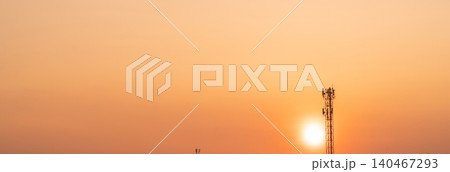 Telecommunication tower with antenna at sunset. Infrastructure of modern communication technology. 5G network connectivity and the global telecommunications industry. Wireless communication industry. Telecommunication tower with antenna at sunset. Infrastructure of modern communication technology. 5G network connectivity and the global telecommunications industry. Wireless communication industry. 140467293