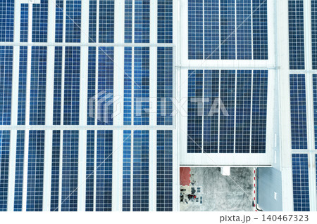 Solar energy for factory and warehouse building. Solar panels on roof of industrial plant. Commercial solar power. Rooftop solar power. Rooftop renewable energy system. Sustainable green energy. Solar energy for factory and warehouse building. Solar panels on roof of industrial plant. Commercial solar power. Rooftop solar power. Rooftop renewable energy system. Sustainable green energy. 140467323