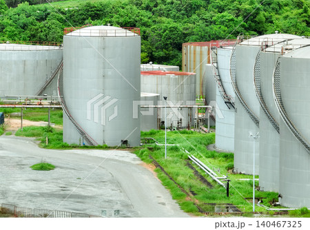 Gas storage tanks in oil refinery and petrochemical plant. Pipelines and industrial infrastructure for energy production and fuel storage in oil and gas industry. Energy supply and fuel production. 140467325