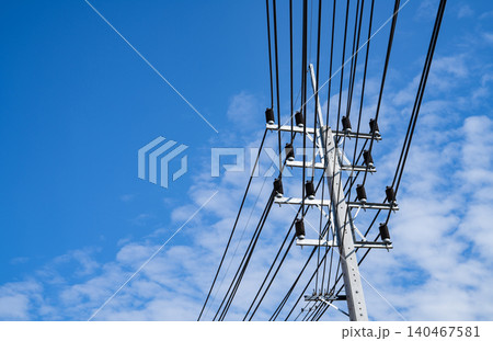 Electricity transmission pylon. Transmission tower collect electricity from wind turbines for sustainable energy. Clean power. Renewable energy infrastructure. Electricity high-voltage lines. Electricity transmission pylon. Transmission tower collect electricity from wind turbines for sustainable energy. Clean power. Renewable energy infrastructure. Electricity high-voltage lines. 140467581
