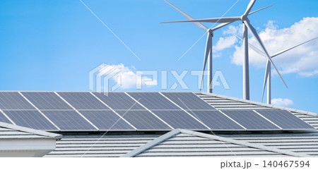 Solar panels on residential rooftop and wind turbine generating clean electricity for urban homes. Sustainable electricity for eco-friendly urban development. Sustainable city. Reduce carbon emissions Solar panels on residential rooftop and wind turbine generating clean electricity for urban homes. Sustainable electricity for eco-friendly urban development. Sustainable city. Reduce carbon emissions 140467594