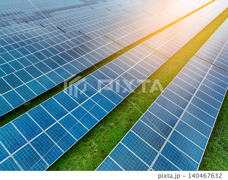 Solar farm and sun light. Solar power for green energy. Sustainable renewable energy. Photovoltaic power station or solar park. Solar panel installation and maintenance concept. Energy sustainability. Solar farm and sun light. Solar power for green energy. Sustainable renewable energy. Photovoltaic power station or solar park. Solar panel installation and maintenance concept. Energy sustainability. 140467632