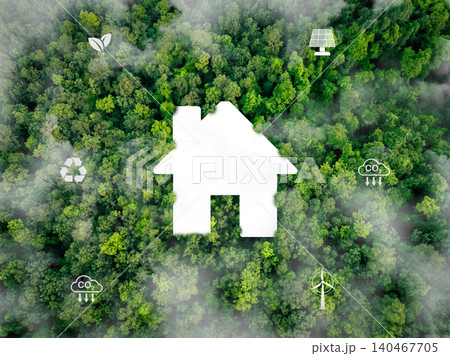 Sustainable home with renewable energy sources. Wind turbines and solar panels providing electricity for energy-efficient urban living and environmentally friendly green building designs. Reduce CO2. Sustainable home with renewable energy sources. Wind turbines and solar panels providing electricity for energy-efficient urban living and environmentally friendly green building designs. Reduce CO2. 140467705