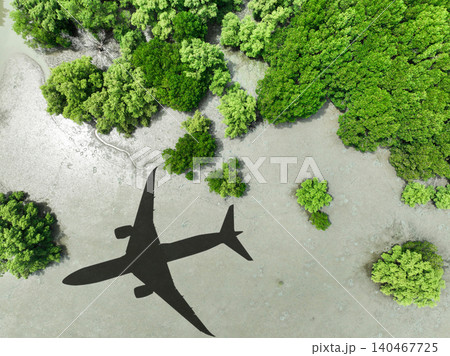 Shadow airplane flying above mangrove forest. Sustainable fuel. Biofuel in aviation. Sustainable transportation and eco-friendly flight with biofuel use. Aviation sustainability. Mangroves capture CO2 Shadow airplane flying above mangrove forest. Sustainable fuel. Biofuel in aviation. Sustainable transportation and eco-friendly flight with biofuel use. Aviation sustainability. Mangroves capture CO2 140467725