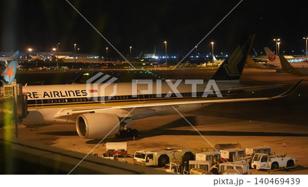 Singapore Airlines Aircraft at Night Airport Terminal Singapore Airlines Aircraft at Night Airport Terminal 140469439