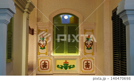 Vintage Window with Green Shutters and Floral Decorations Vintage Window with Green Shutters and Floral Decorations 140470698