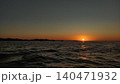 Sun setting over croatian coastline in summer evening 140471932
