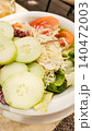 Fresh summer salad with cucumber, tomatoes, and cabbage enjoyed during vacation in croatia 140472003