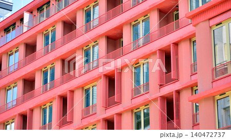 View of modern residential building with glass balconies and bright facade. Contemporary apartment building in european city. Concept of urban living and modern architecture.  140472737