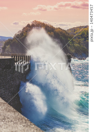 Beautiful seascape in northern Spain. The rocky coast on a sunny day. Beautiful nature, landscape with a stormy sea. The embankment in San Sebastian, Basque Country, Spain, Europe Beautiful seascape in northern Spain. The rocky coast on a sunny day. Beautiful nature, landscape with a stormy sea. The embankment in San Sebastian, Basque Country, Spain, Europe 140473457