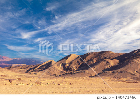 Mountain nature landscape. Desert on a sunny day. Negev Desert. View of the valley with mountains on backdrop. Nature Israel 140473466