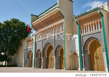 The golden gates of the Royal Palace of Fez display majestic traditional zellige mosaics in Morocco The golden gates of the Royal Palace of Fez display majestic traditional zellige mosaics in Morocco 140474779
