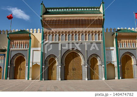 The golden gates of the Royal Palace of Fez display majestic traditional zellige mosaics in Morocco The golden gates of the Royal Palace of Fez display majestic traditional zellige mosaics in Morocco 140474782