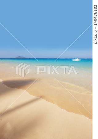 Ocean, Hawaii and blue sky for holiday, sand and rocks in shore for peace and tranquility. Seaside, waves and summer for vacation, location and beach for clear water on travel and tropical trip Ocean, Hawaii and blue sky for holiday, sand and rocks in shore for peace and tranquility. Seaside, waves and summer for vacation, location and beach for clear water on travel and tropical trip 140476182