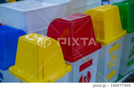 Trash can supplier. Plastic recycling bins for Eco-friendly waste management. Blue, red, yellow, and green bins for sustainable disposal. Plastic trash can distributor. Container for sorting waste. Trash can supplier. Plastic recycling bins for Eco-friendly waste management. Blue, red, yellow, and green bins for sustainable disposal. Plastic trash can distributor. Container for sorting waste. 140477999