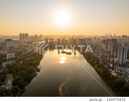 Aerial View of Nanning City at Sunset Overlooking the Nanhu Lake and Skyline Aerial View of Nanning City at Sunset Overlooking the Nanhu Lake and Skyline 140479432