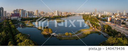 Panoramic View of Nanning Cityscape with Lake and Urban Skyline at Sunset Panoramic View of Nanning Cityscape with Lake and Urban Skyline at Sunset 140479436