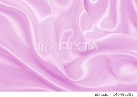 Smooth elegant pink silk or satin texture as wedding background. Luxurious background design Smooth elegant pink silk or satin texture as wedding background. Luxurious background design 140480288