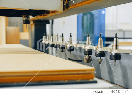 Cutting tools are ready for use in a furniture workshop at midday 140481154