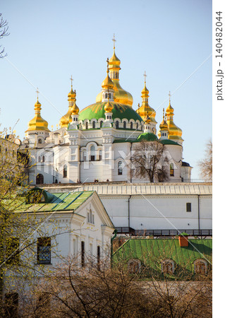 Cathedral of the Assumption of the Most Holy Theotokos. Golden Domes of Kyiv Pechersk Lavra Orthodox Monastery with Cathedral Architecture Cathedral of the Assumption of the Most Holy Theotokos. Golden Domes of Kyiv Pechersk Lavra Orthodox Monastery with Cathedral Architecture 140482044