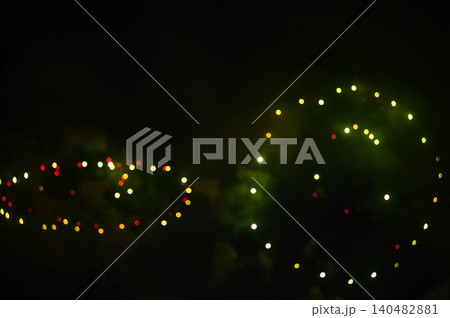Stunning and colorful fireworks display in the night sky. Real fireworks background. Abstract of real shining fireworks against black background. Glowing fireworks show for celebration. Stunning and colorful fireworks display in the night sky. Real fireworks background. Abstract of real shining fireworks against black background. Glowing fireworks show for celebration. 140482881
