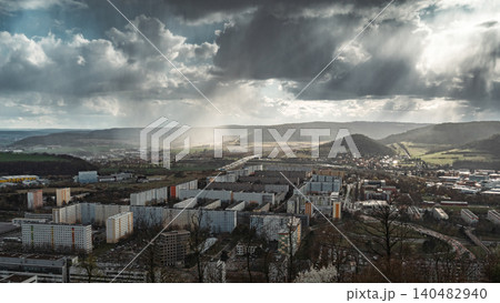 Sunbeams and Rain Over City Valley Landscape Sunbeams and Rain Over City Valley Landscape 140482940
