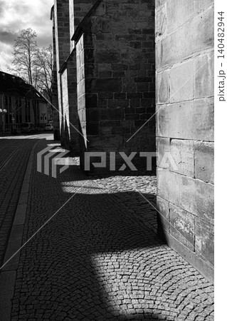 Erfurt, Germany - March 27, 2026. Black and White Historic Stone Street Erfurt, Germany - March 27, 2026. Black and White Historic Stone Street 140482944