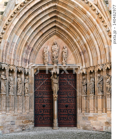 Erfurt, Germany - March 27, 2026. Ornate Gothic Church Portal Erfurt, Germany - March 27, 2026. Ornate Gothic Church Portal 140482977
