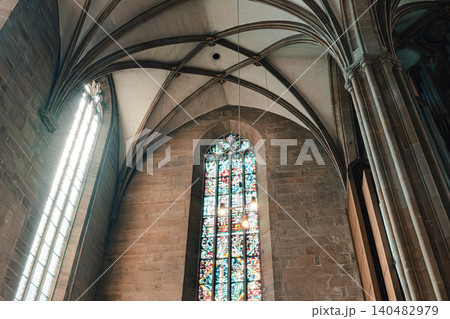 Erfurt, Germany - March 27, 2026. Gothic Arches and Stained Glass Erfurt, Germany - March 27, 2026. Gothic Arches and Stained Glass 140482979