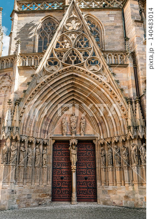 Erfurt, Germany - March 27, 2026. Ornate Gothic Cathedral Portal Erfurt, Germany - March 27, 2026. Ornate Gothic Cathedral Portal 140483014