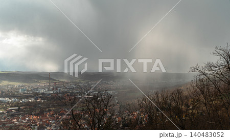 Heavy Rain Shower Over Town and Valley Heavy Rain Shower Over Town and Valley 140483052