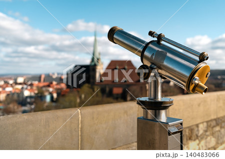 Erfurt, Germany - March 27, 2026. Telescope With Blurred Erfurt Cathedral View Erfurt, Germany - March 27, 2026. Telescope With Blurred Erfurt Cathedral View 140483066