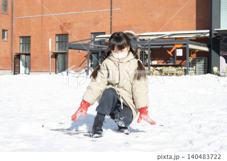 Happy Asian Child Playing in Snow Winter Outdoor, Cute Girl Making Snowball and Snowman, Joyful Cold Weather Lifestyle 140483722