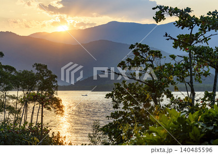Sunset between the sea and the mountains Sunset between the sea and the mountains 140485596