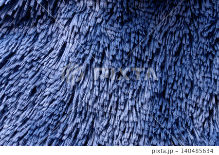 Deep blue fabric texture with soft textured fibers close up Deep blue fabric texture with soft textured fibers close up 140485634