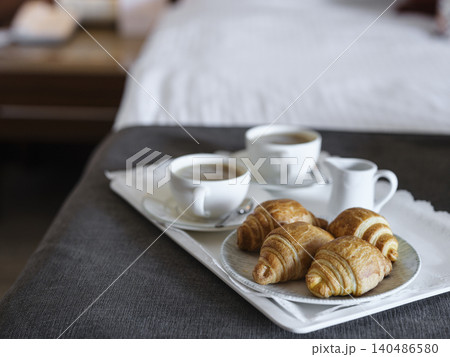 breakfast with coffee and croissant in hotel room breakfast with coffee and croissant in hotel room 140486580