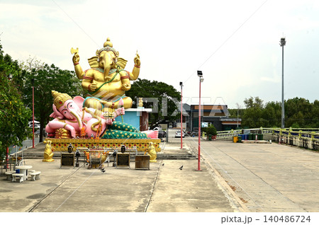 Outdoor large Statues of Lord Ganesha in seated and reclining poses in Bang Sai Public Park. Outdoor large Statues of Lord Ganesha in seated and reclining poses in Bang Sai Public Park. 140486724