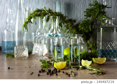 Glasses with Gin on a table in bar. Glasses with Gin on a table in bar. 140487219