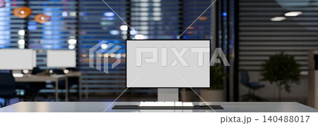 3D Computer with blank screen on table at night time in office 3D Computer with blank screen on table at night time in office 140488017