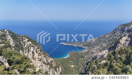 Mountain ocean landscape. Oceanic pine landscape.Cliffside forest coastline Coastal rocky Mountain ocean landscape. Oceanic pine landscape.Cliffside forest coastline Coastal rocky 140489963