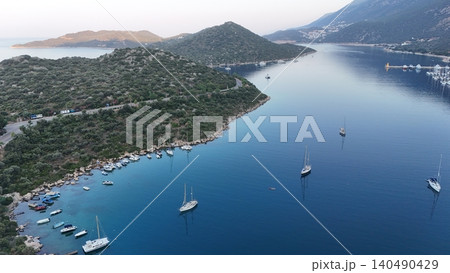 Coastal mountain landscape, sea resort yachts, golden hour 140490429