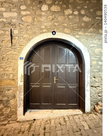 Old unusual door. High quality photo Old unusual door. High quality photo 140490539