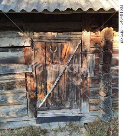 Old wooden rural bathhouse building with rustic architecture and weathered timber exterior. Old wooden rural bathhouse building with rustic architecture and weathered timber exterior. 140491033