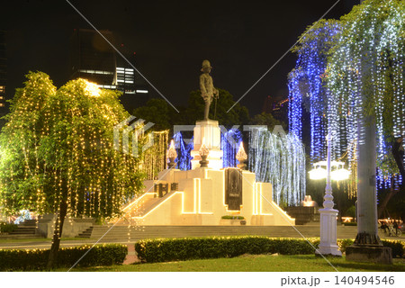 The trees are beautifully illuminated with lights at the front gate of Lumpini Park on Red Cross Fair event. The trees are beautifully illuminated with lights at the front gate of Lumpini Park on Red Cross Fair event. 140494546