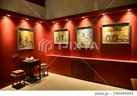The framed paintings inside the exhibition hall of the Kuche Palace are renowned as the residence of the last patriotic prince, who played a key role in the liberation of Xinjiang.China. The framed paintings inside the exhibition hall of the Kuche Palace are renowned as the residence of the last patriotic prince, who played a key role in the liberation of Xinjiang.China. 140494843